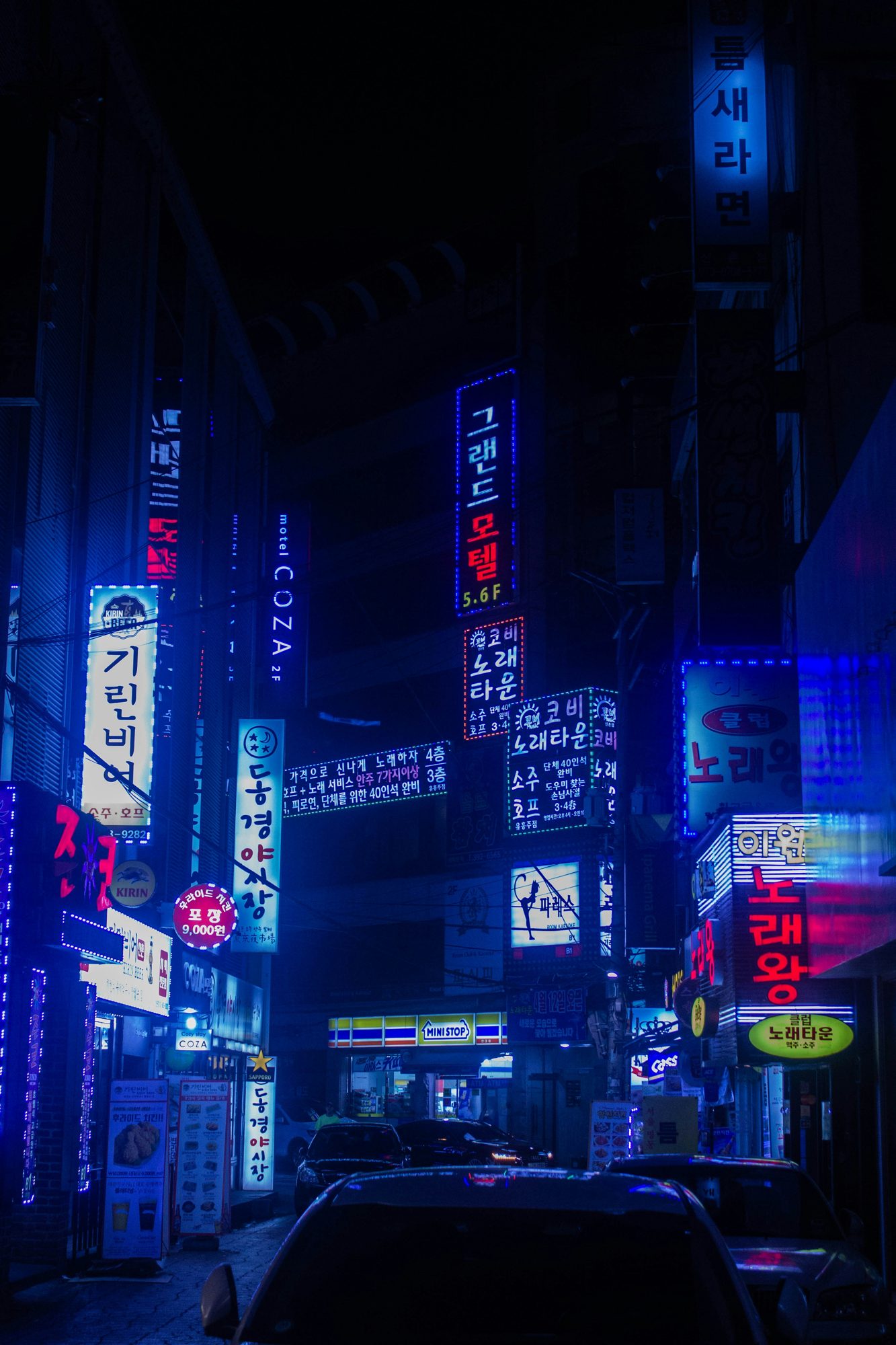 Neon-lit alley in Seoul at night